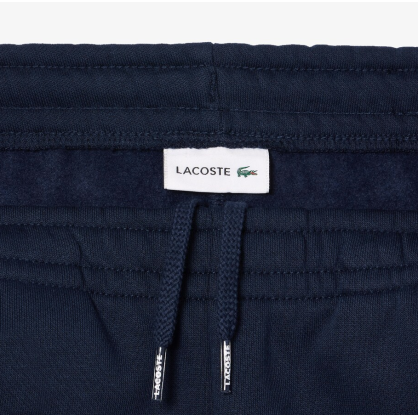 Pantalon de survêtement enfant Lacoste – Coton bio & bandes contrastées | XJ5327-ISV